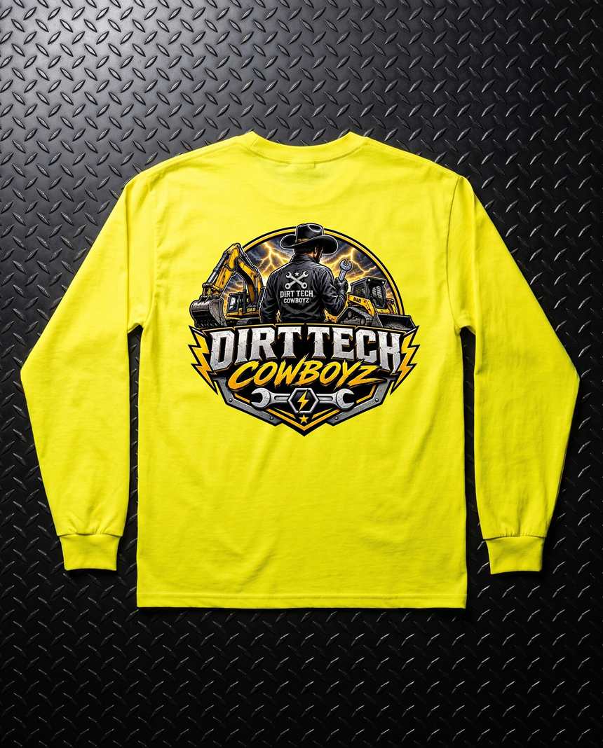 Safety yellow Dirt Tech Cowboyz long sleeve tee laid flat on diamond plate steel.